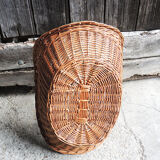 Old basket with logs in light wicker