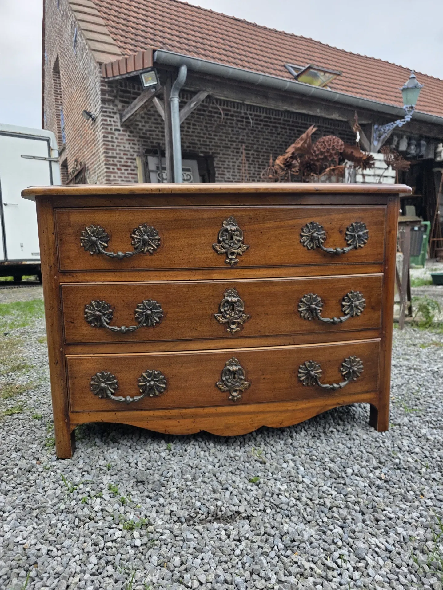 Curved Louis XV style chest of drawers in solid walnut