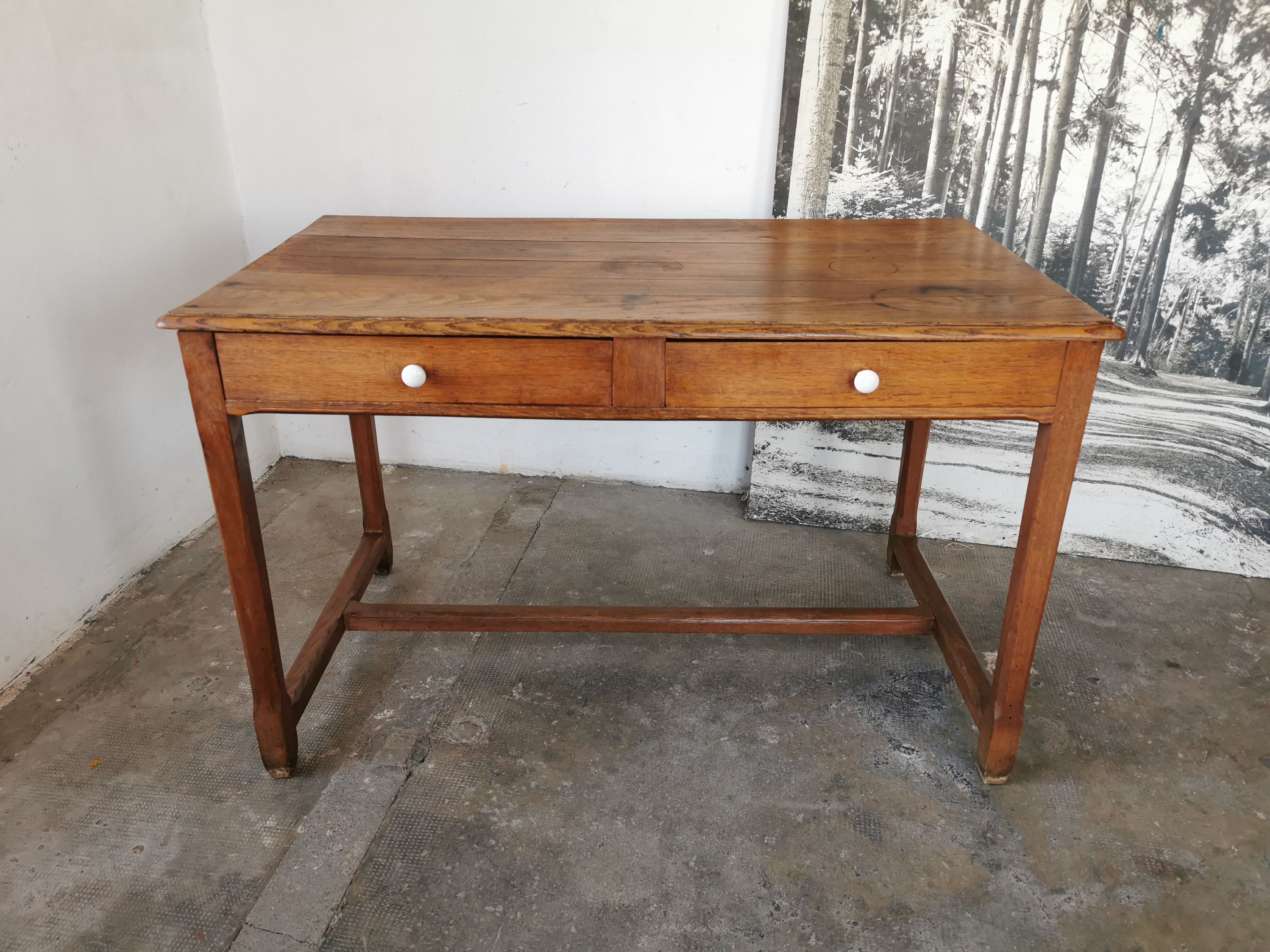 Table in raw oak, countryside.