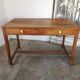 Table in raw oak, countryside.
