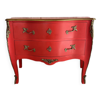 Curved poppy red chest of drawers