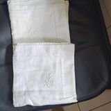 2 Pillowcases with flower decoration and satin stitch surround.