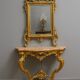Important console table with a curved shape + Louis XV style mirror in gilded and silvered wood.