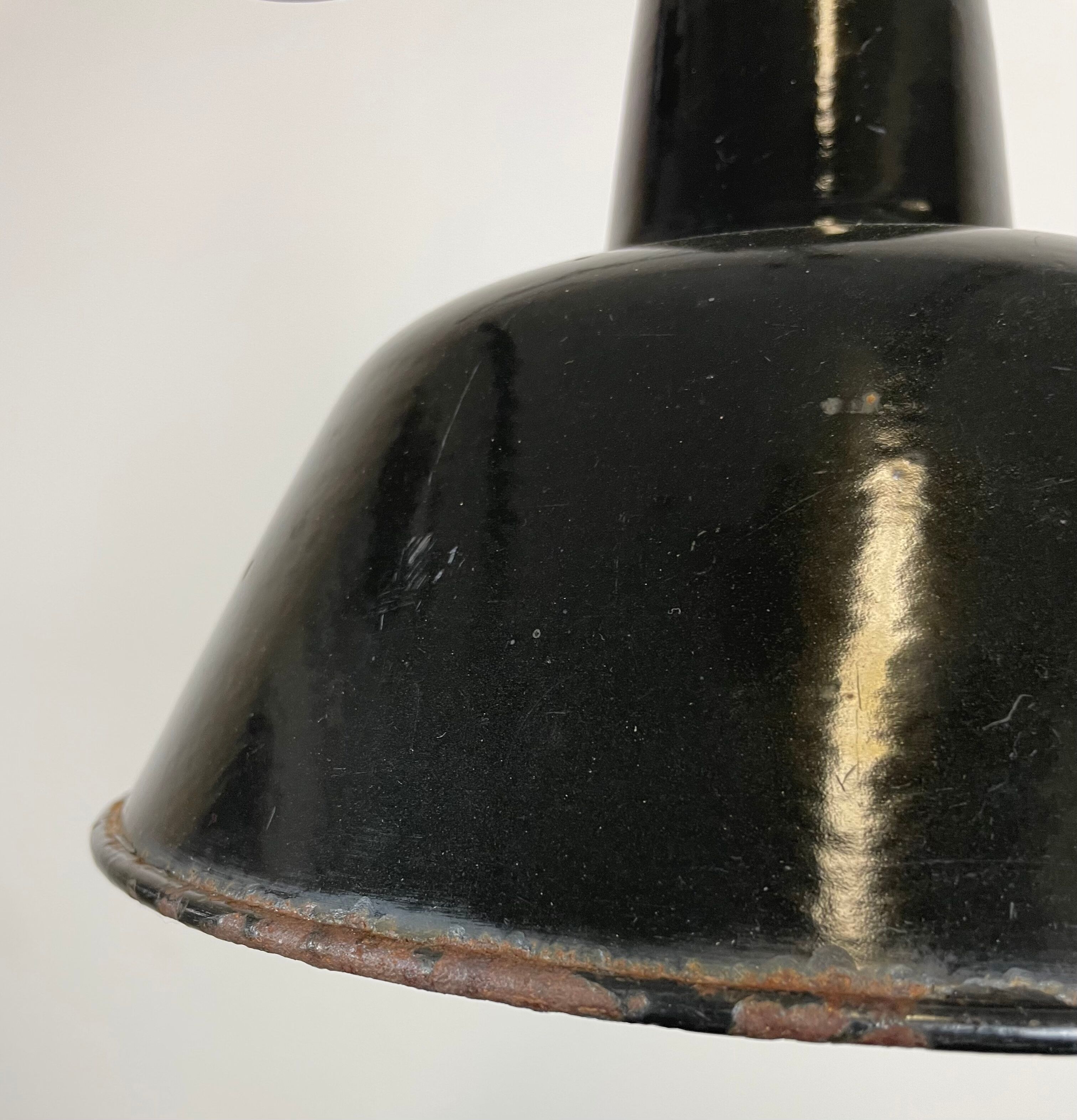 Industrial black enamel factory lamp with cast iron top, 1950s