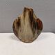 A beautiful Brutalist vase in lovely earth tones. Danish, from the 1980s.