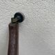 Old wooden shop rack valet casters