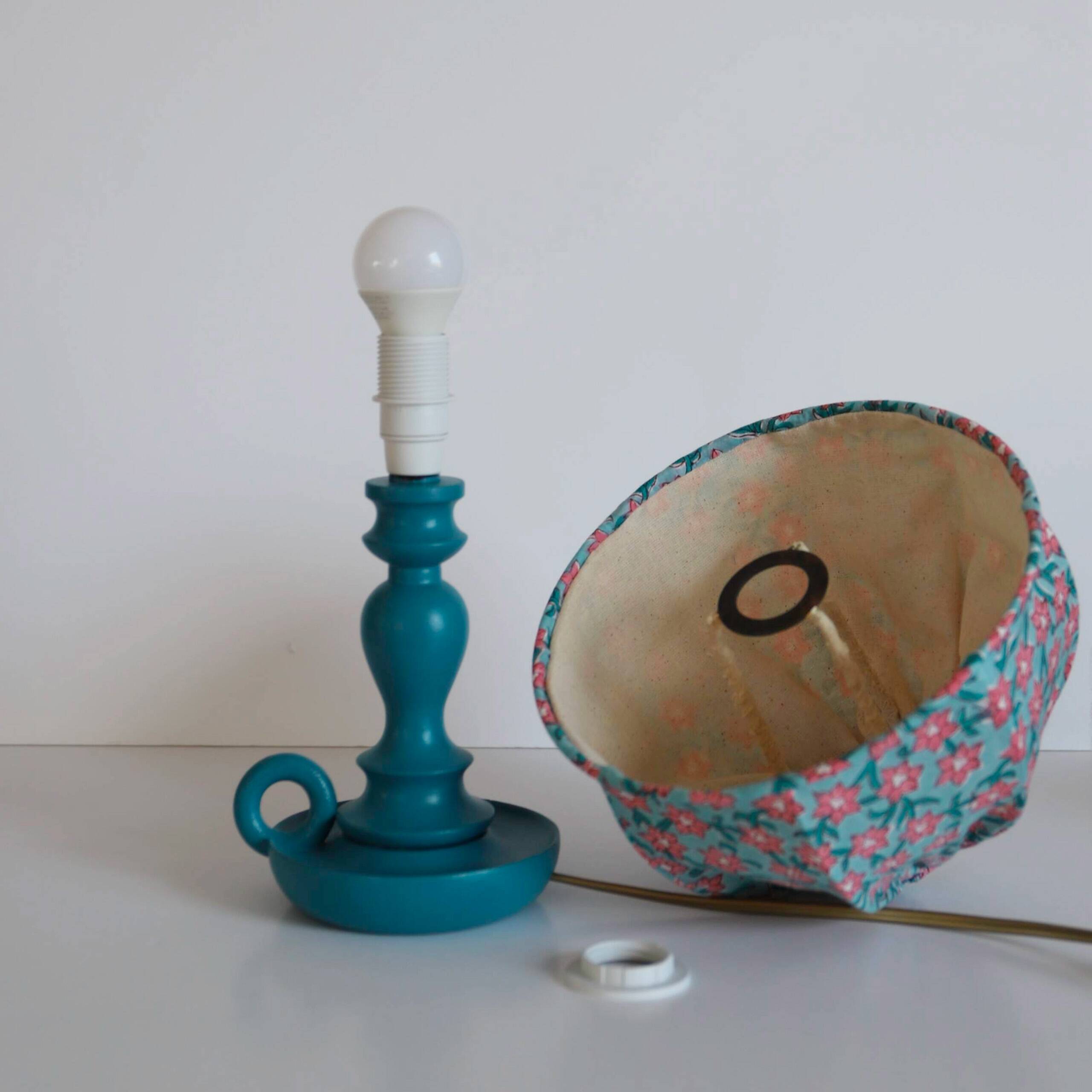 Small old candlestick lamp with hand-stitched flowered lampshade