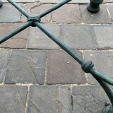 Pair of verdigris metal and glass side tables