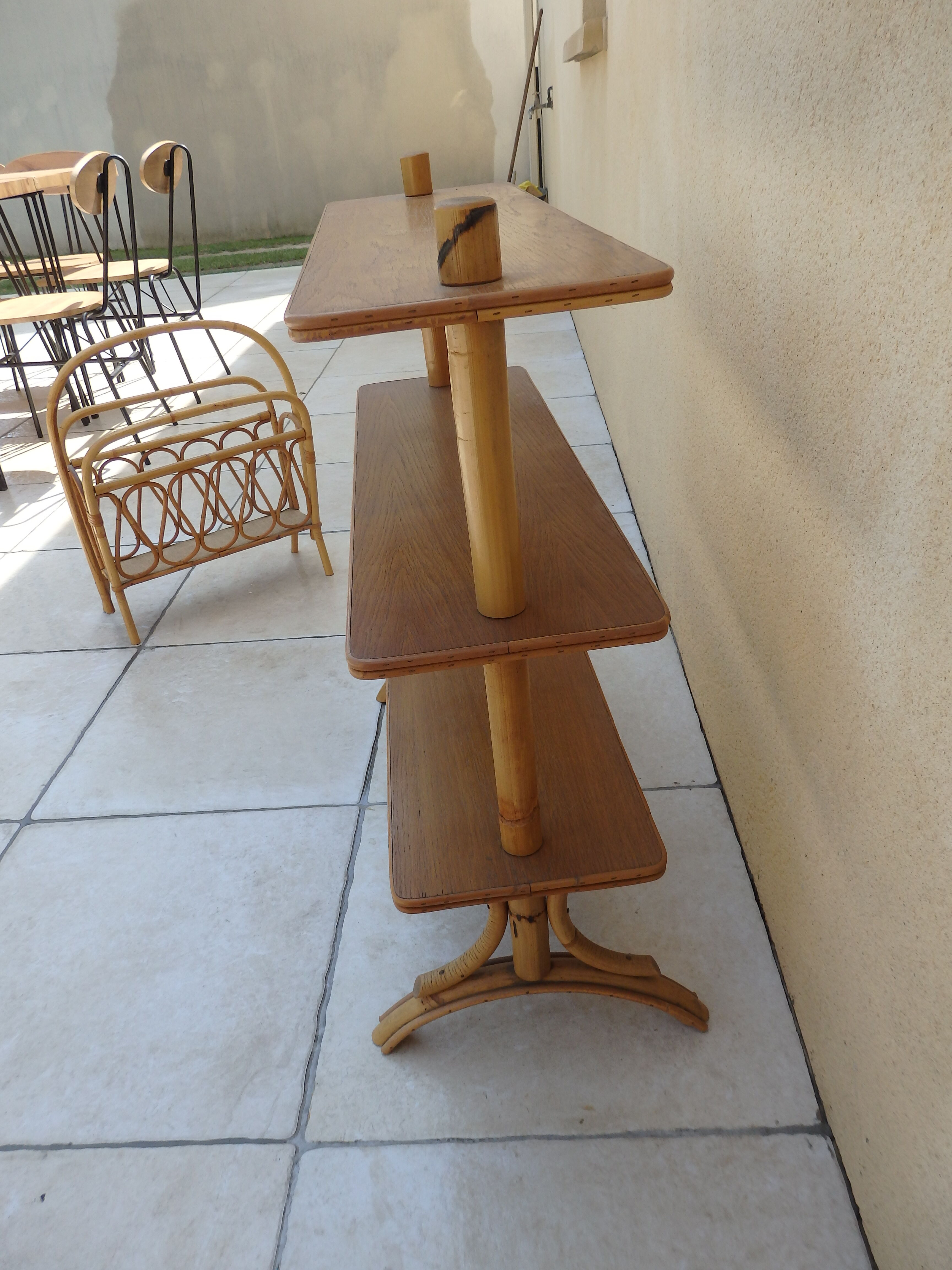 Vintage rattan shelf on feet
