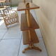 Vintage rattan shelf on feet