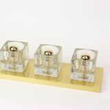 Exclusive wall sconces in crystal and brass by Peill & Putzler, Germany.