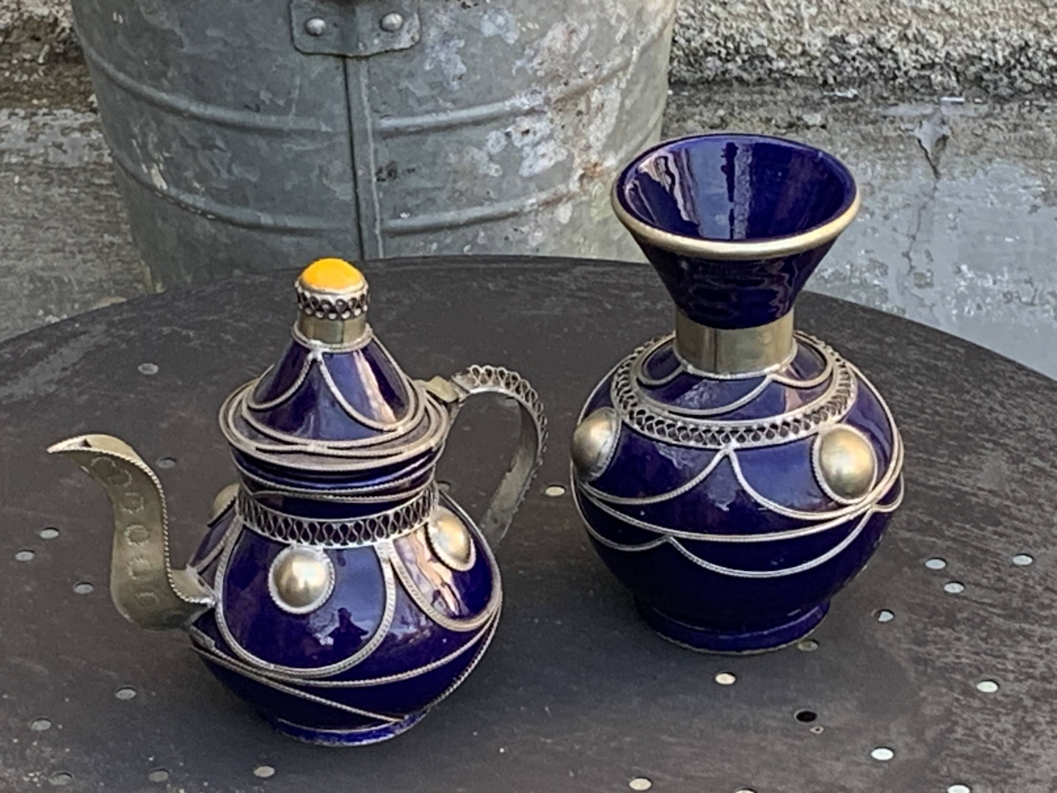 Vase and small teapot in cobalt blue enameled ceramic with artisanal and oriental pewter inserts