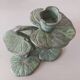 Ivy leaf design candle holder in green patinated metal