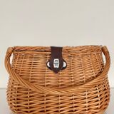 Woven wicker basket with handle