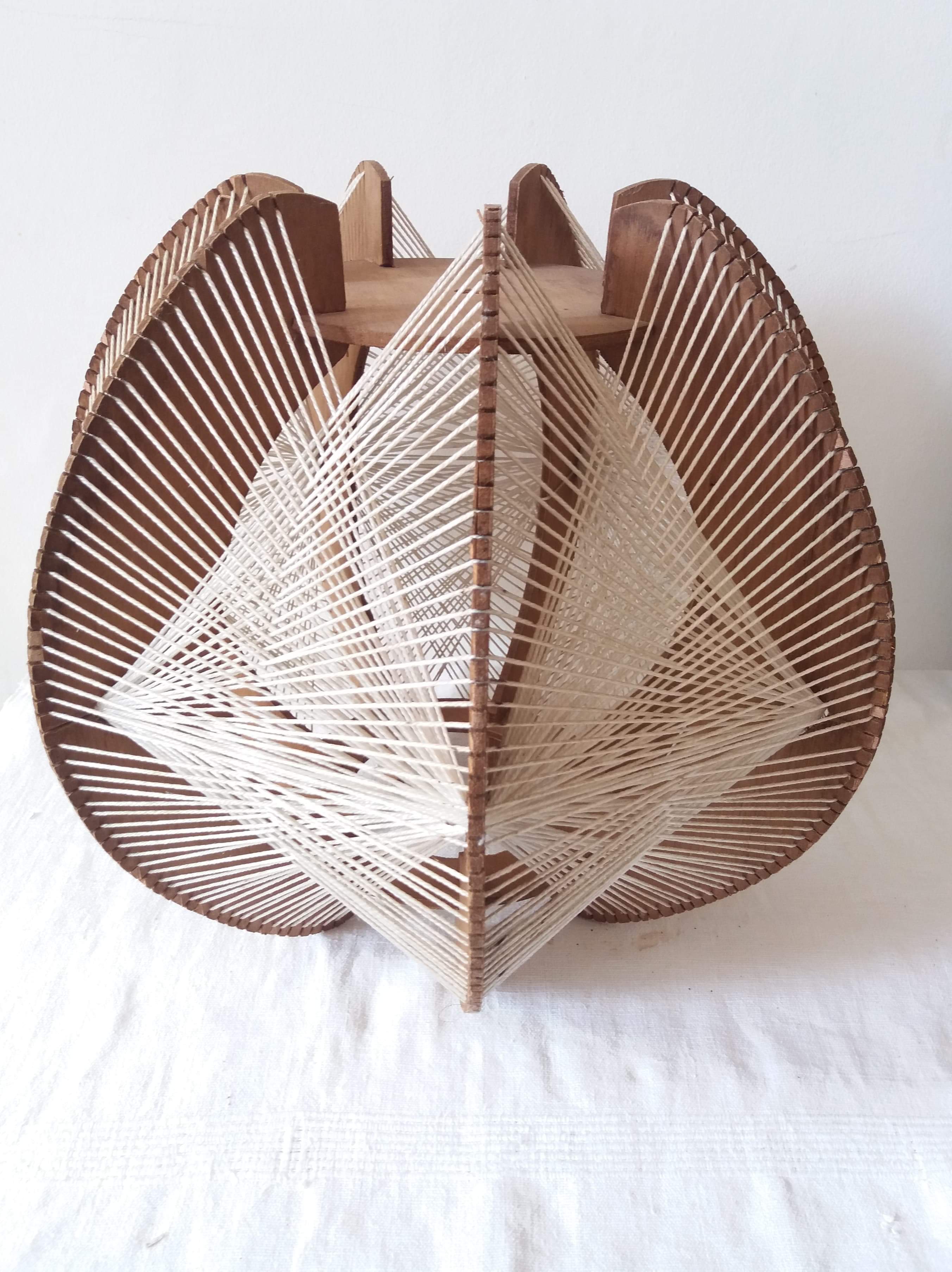 Scandinavian hanging lamp in wood and stretched wires
