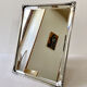 Antique framed mirror, bevelled glass and silver-plated metal frame, 1930-1940.