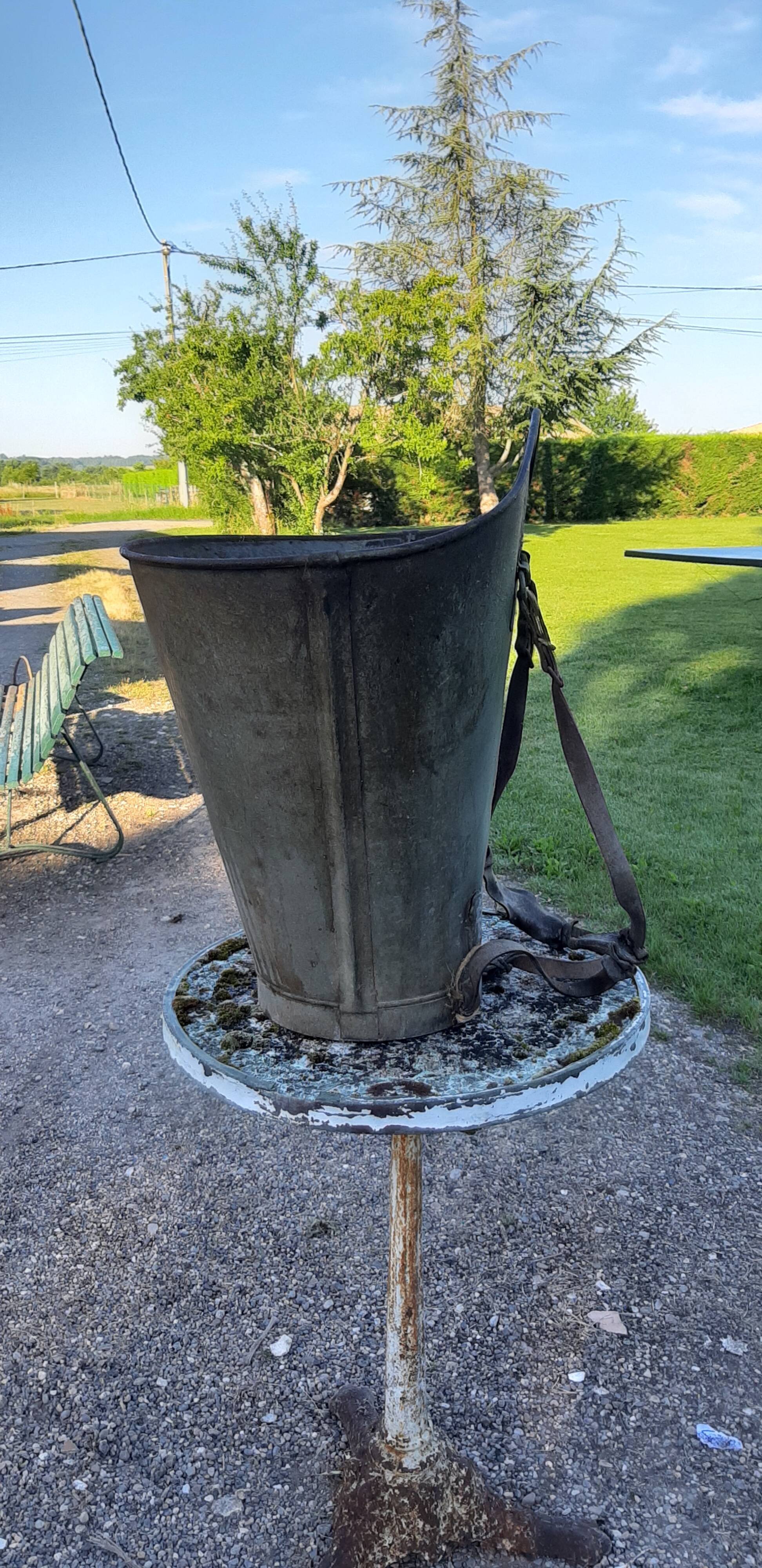 Galvanized metal and leather harvest hood