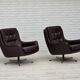 1970s, set of two swivel lounge chairs with footstool, leather.