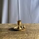 Small golden hand candlestick with a round loop handle D8 H6.5