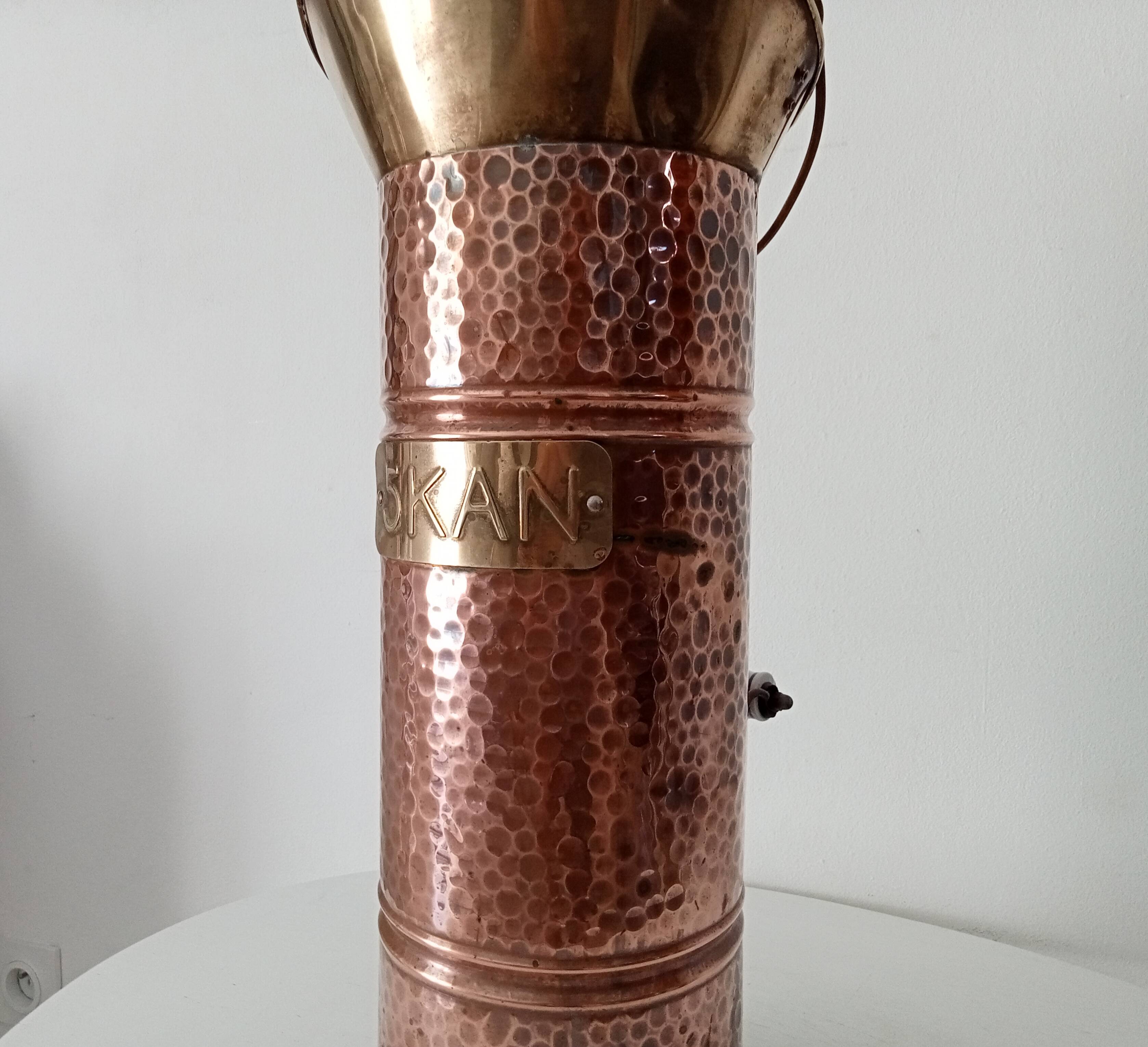 Old umbrella stand in copper, brass and porcelain
