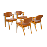 Four Kai Kristiansen oak chairs with new leather upholstery