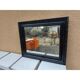 Black lacquered wood mirror "originally punctured"