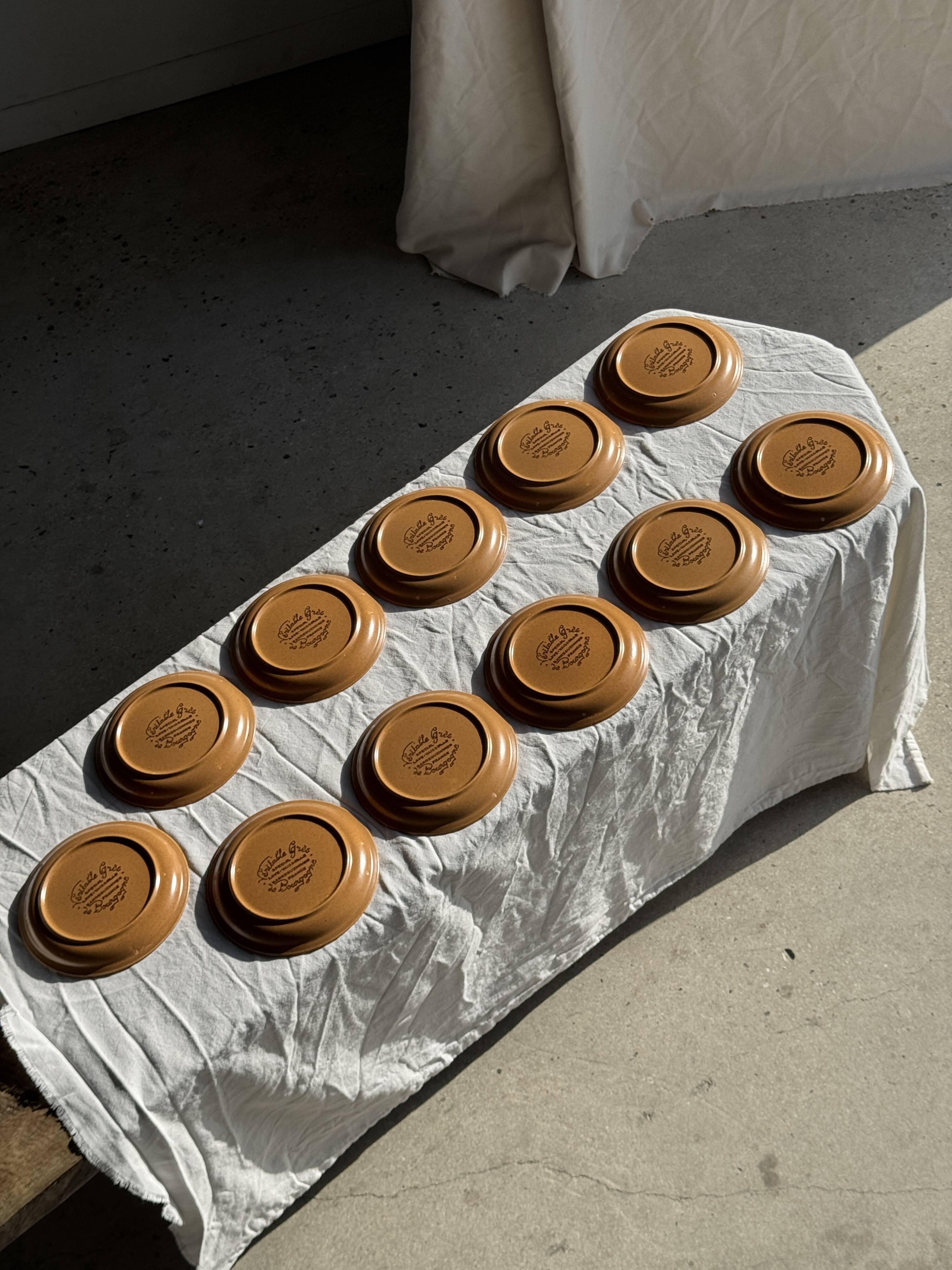 Set of 11 small dessert plates in brown-striped stoneware from Sarreguemines.