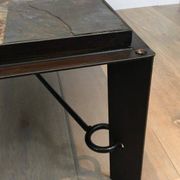 Rare coffee table in steel and wrought iron with a top made of lava stones