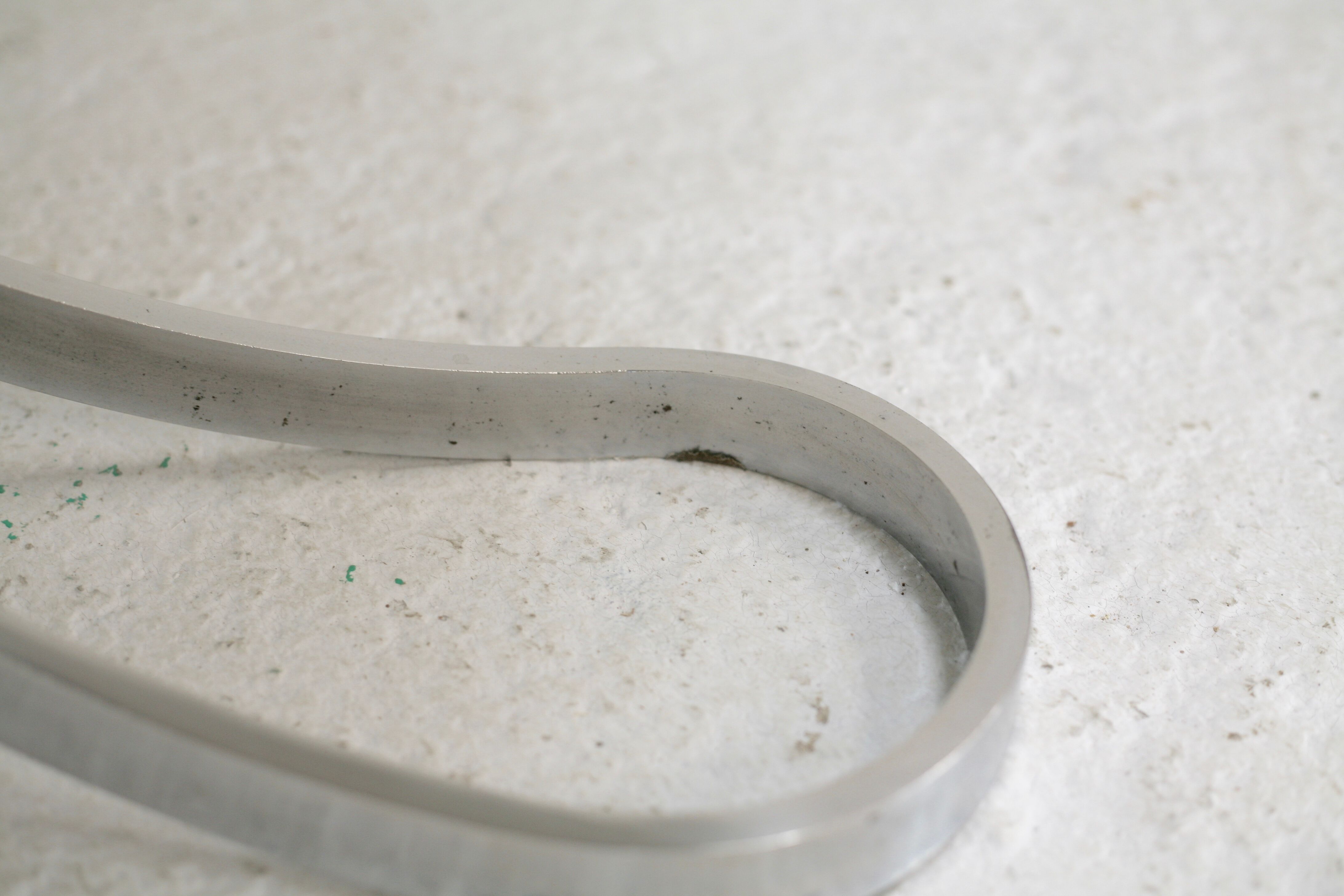 Living room table "Space Age" polished steel, circular slab smoked glass. France, circa 1970.