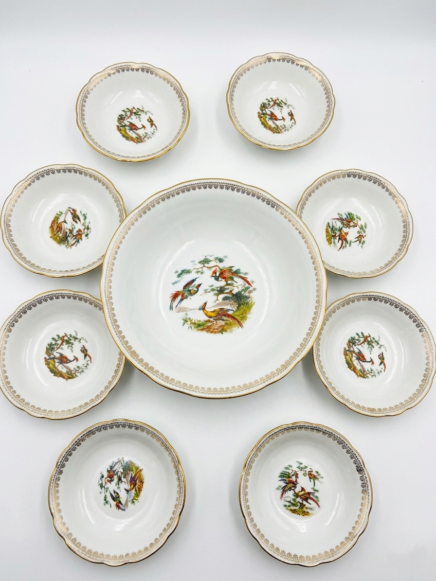 Luxury porcelain dessert service from the National Company - Birds of