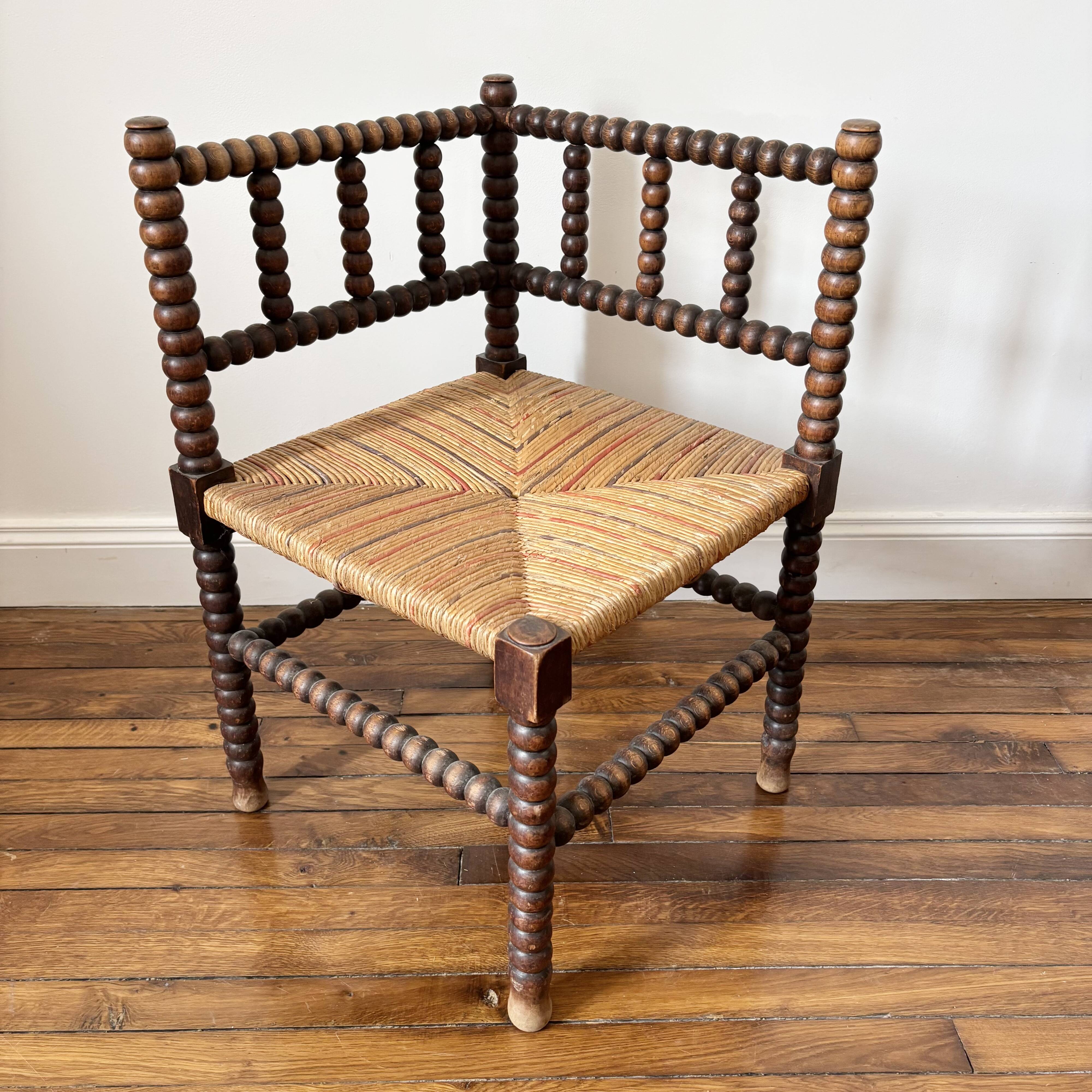 Vintage corner chair in turned wood and straw
