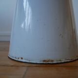 White enamelled metal broc