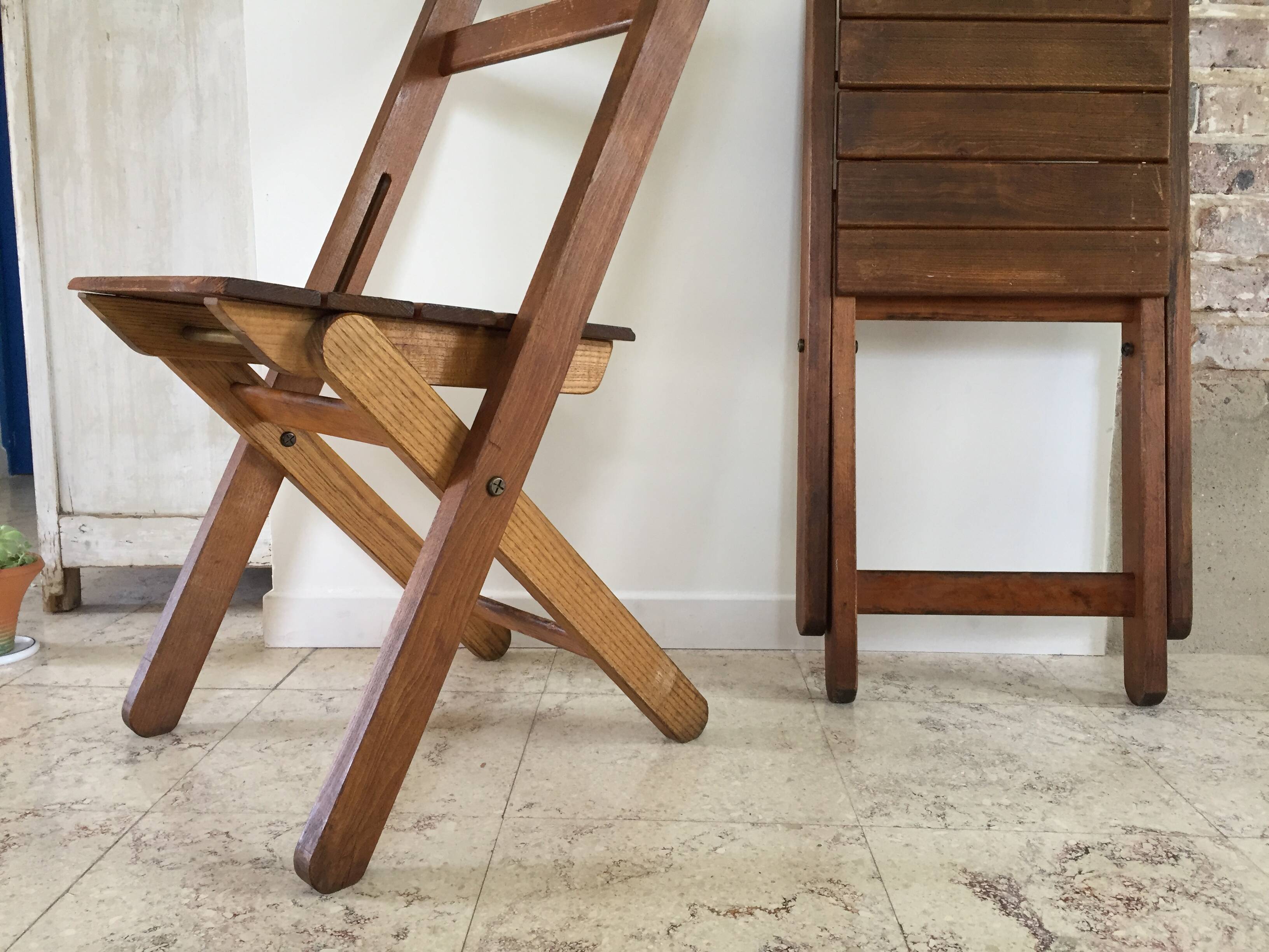 Folding chairs "by the wood fire"