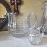 2 antique glass pitchers
