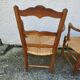 Pair of provencal straw armchairs in walnut