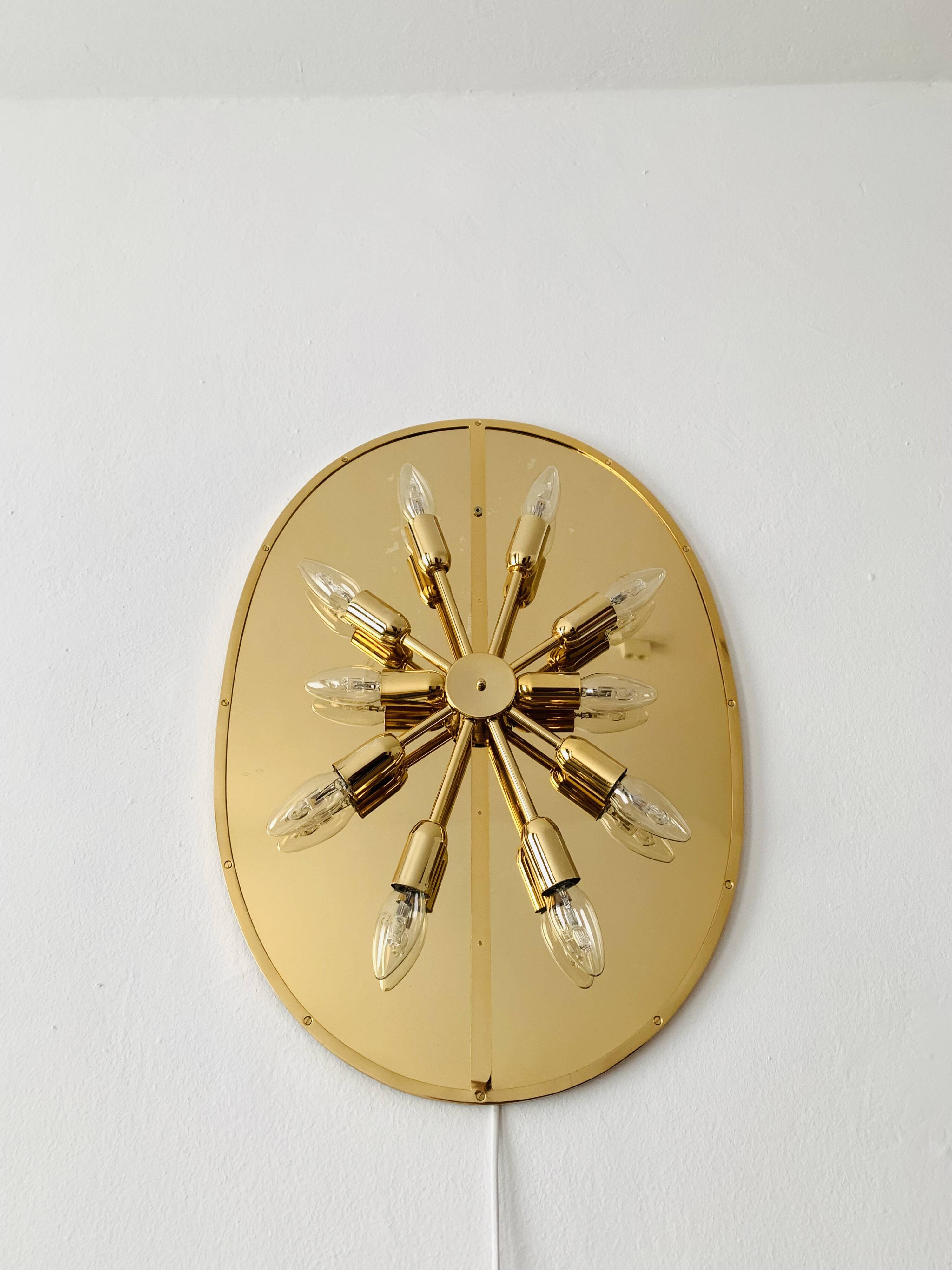 Illuminated floral mirror by Palwa