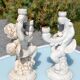 Pair of "cherub" candle holders in plaster