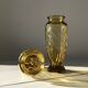Duo of art deco vases in yellow glass with scroll patterns
