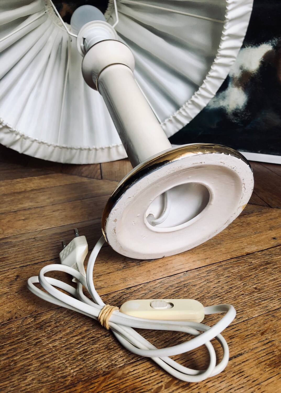 Vintage ivory ceramic lamp with gilding.
