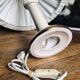 Vintage ivory ceramic lamp with gilding.