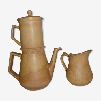 Old coffee maker and sandstone pitcher