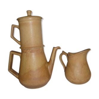 Old coffee maker and sandstone pitcher