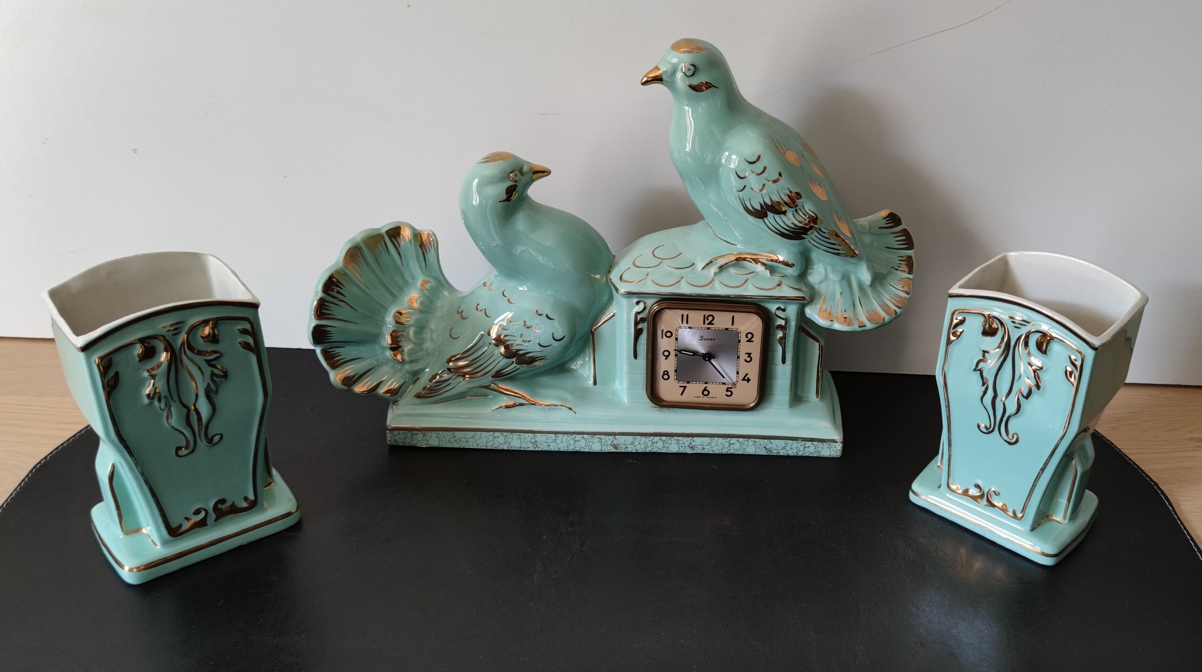 Fireplace clock with matching vases