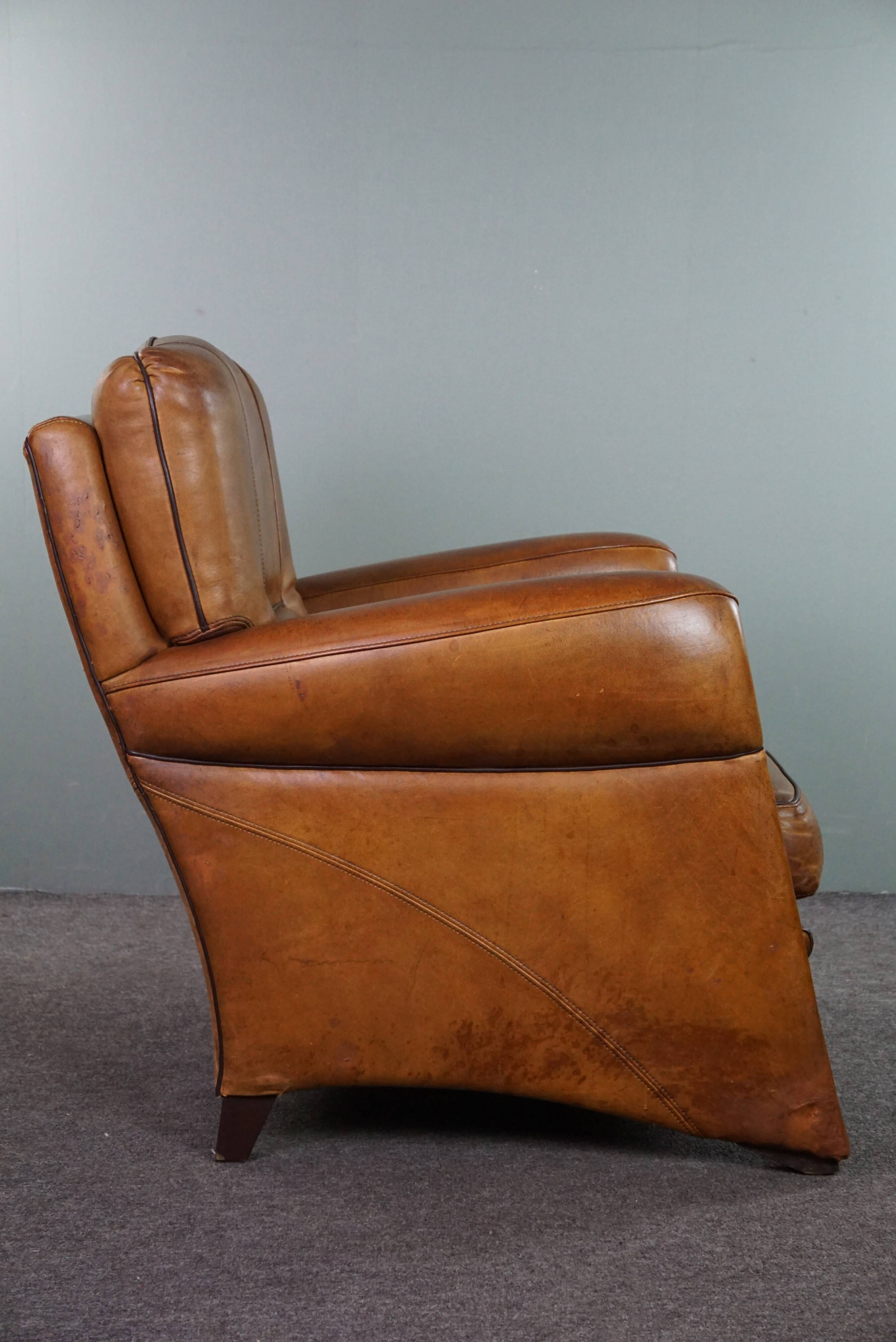 Striking modern design armchair made of high-quality sheepskin leather