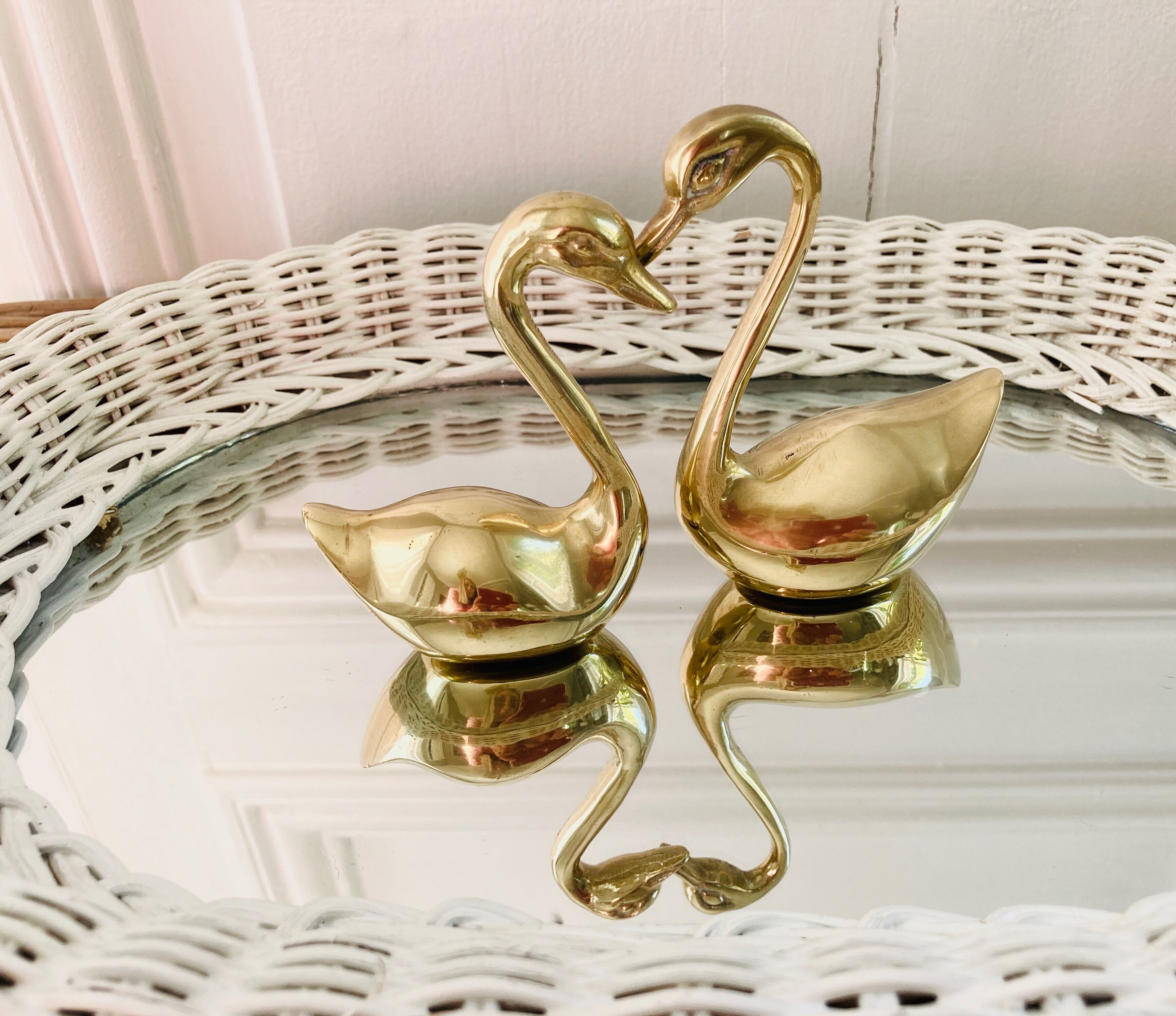 Couple of brass swans