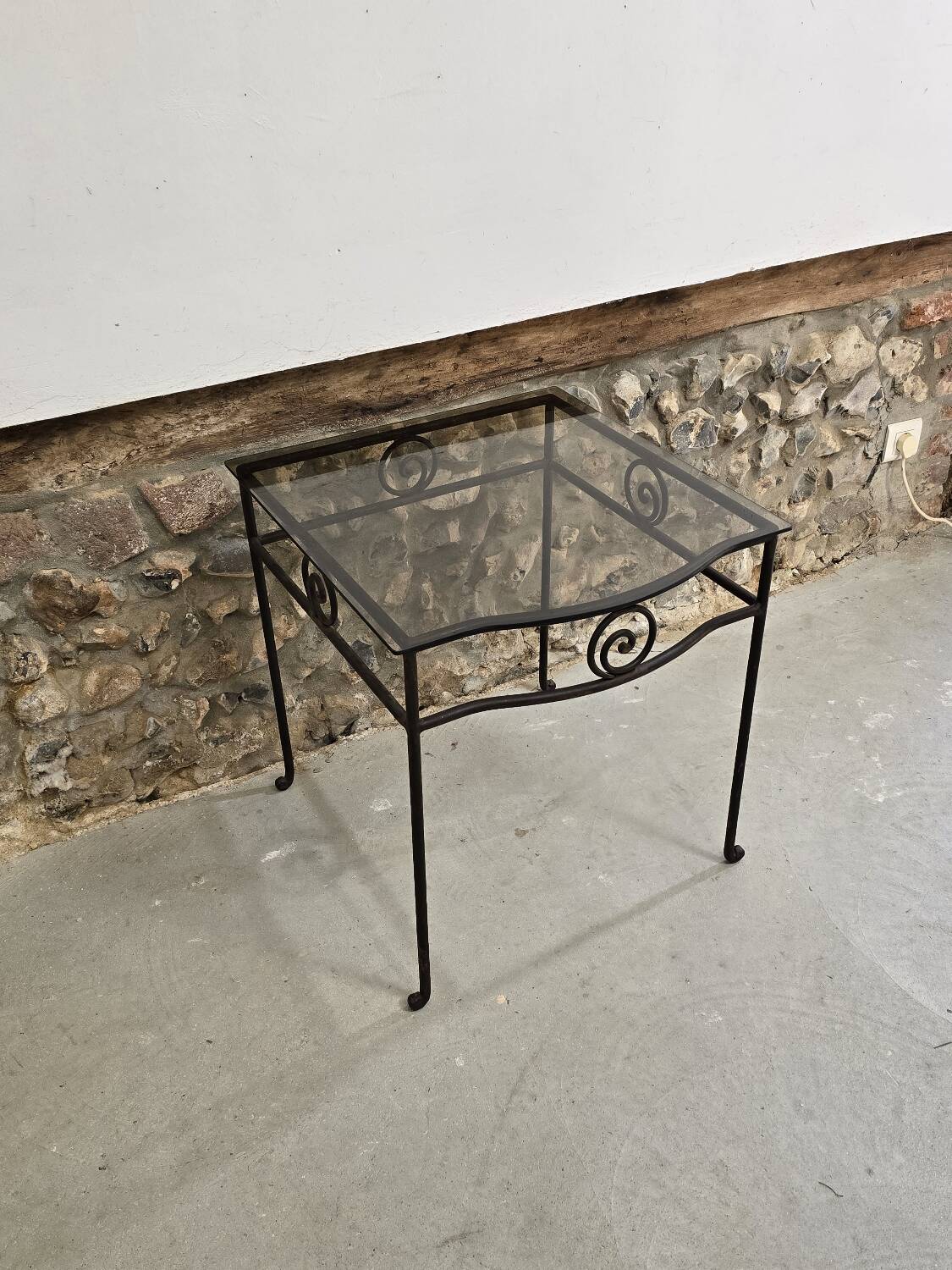 Small side table in wrought iron and smoked glass