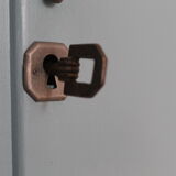 Asymmetrical wardrobe typical of the 50