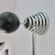 "Streamline" wall coat rack in chromed metal and black lacquered wood, 1970.