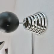 "Streamline" wall coat rack in chromed metal and black lacquered wood, 1970.