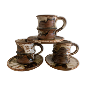3 cups and 3 under cups in glazed stoneware signed